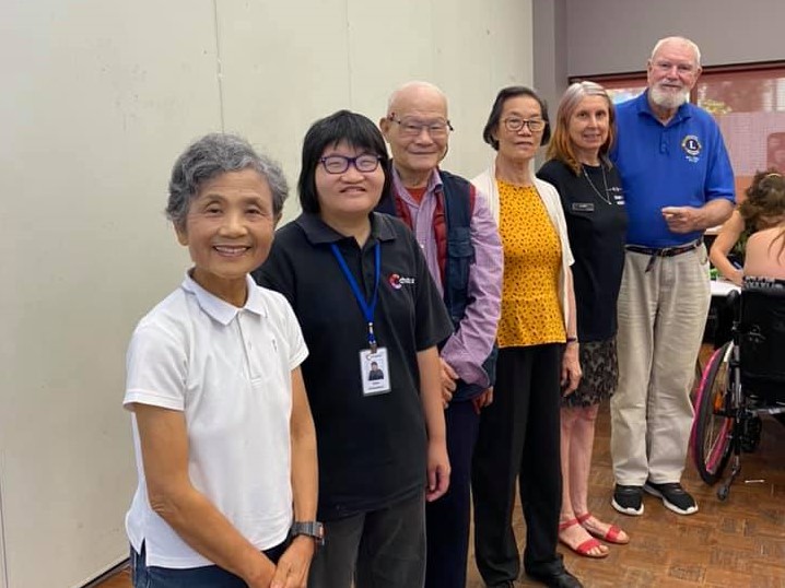 Bill with Chorus Voices Judith and his ESL language student's at Chorus Bull Creek