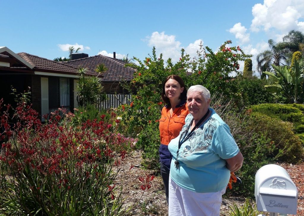 Chorus Gardening - older lady in garden with Chorus gardener